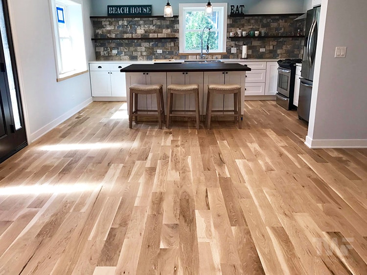 Colored epoxy to new hickory floor. We used this instead of wood filler.