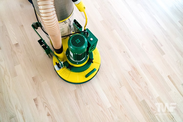 Sanding floor clearance with belt sander