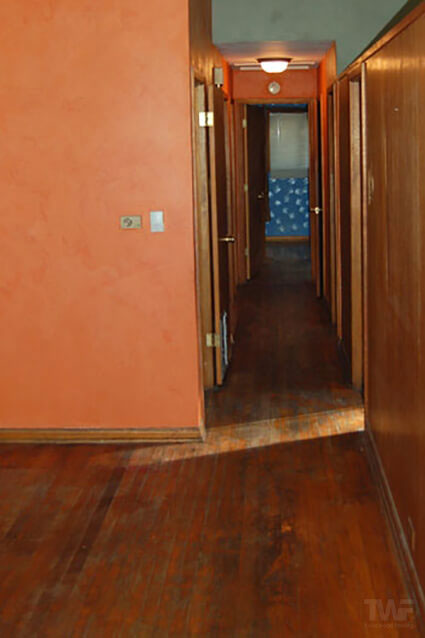 Before - Hallway in bad shape and pet stains
