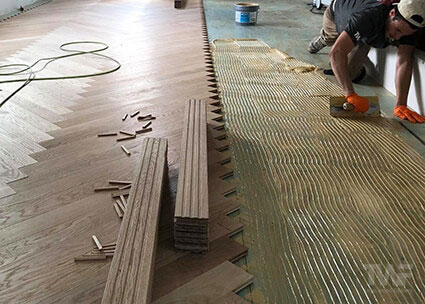 Glue down Herringbone wood floor installation in Naperville