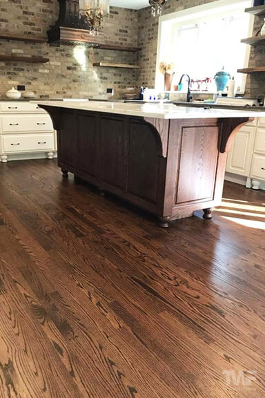Red Oak flooring with Loba Hybrid stained Ebony and Sedona Red