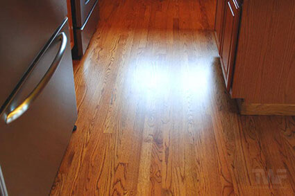 Refinished kitchen floor with Nutmeg Brown Stain