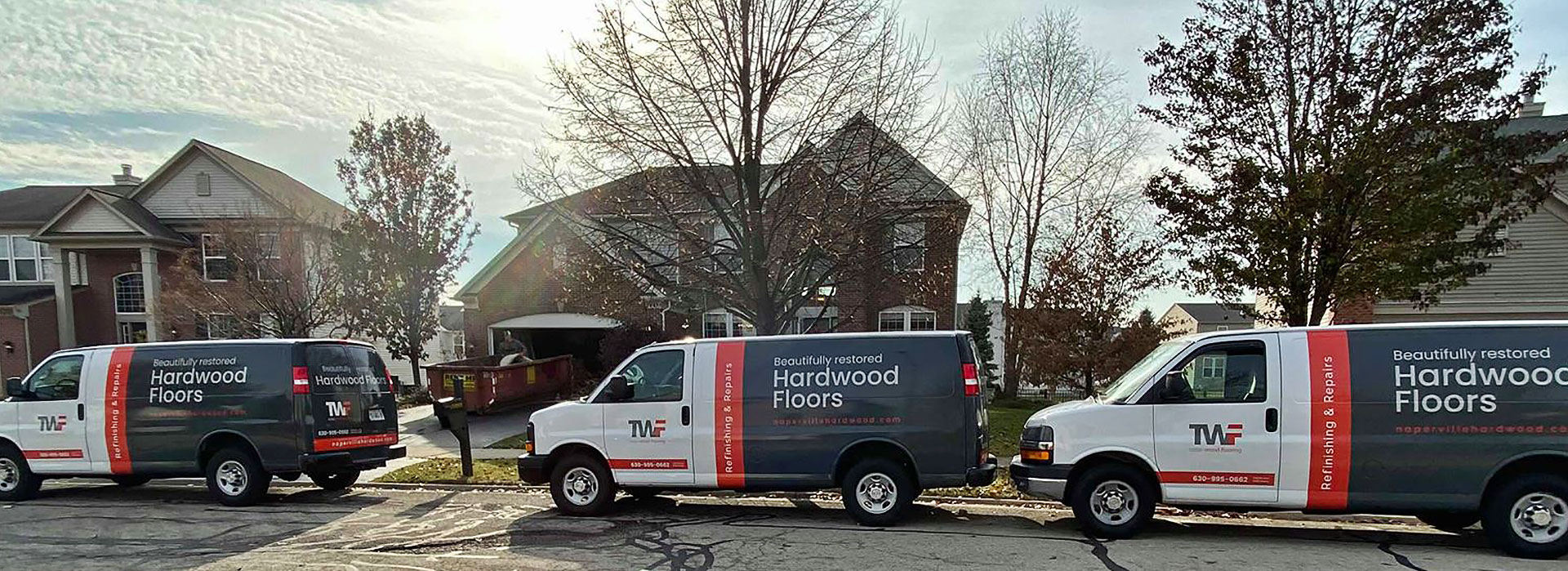 Hardwood Floor Refinishing Vans in front of Naperville House