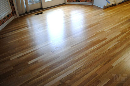 After - White oak flooring fully restored