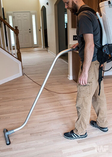 Vacuuming Hardwood Floor